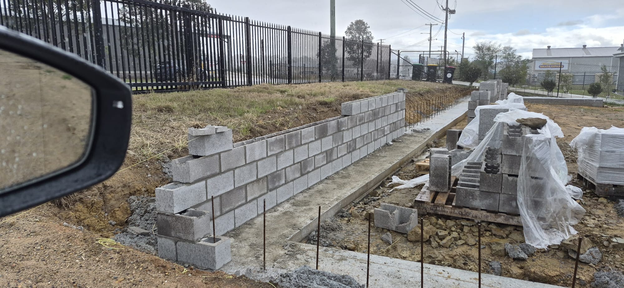 Blockwork retaining wall going up on the new Singleton workshop site